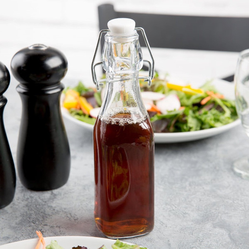 Acopa Clear Glass Bottle with Wire Bail Swing Top Lid