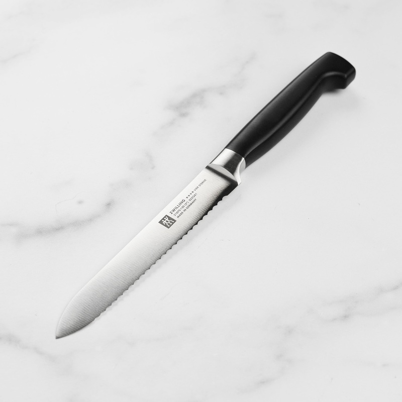 Zwilling Four Star 5″ Serrated Utility Knife